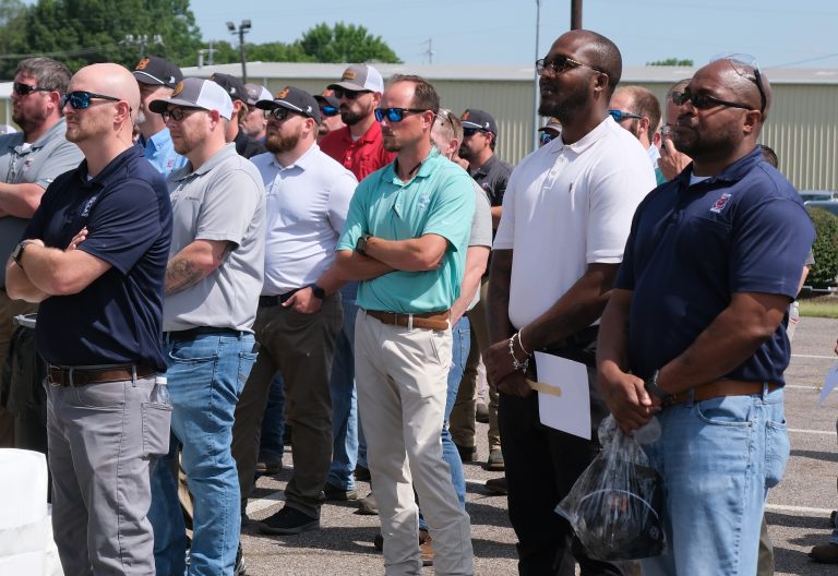 Large group gathered outdoors, including ERMCO leadership, production staff, and representatives from ACEI, Exelon, Woodruff Electric, and the local community, attending a ceremony for the nine millionth transformer milestone in Dyersburg, Tennessee.