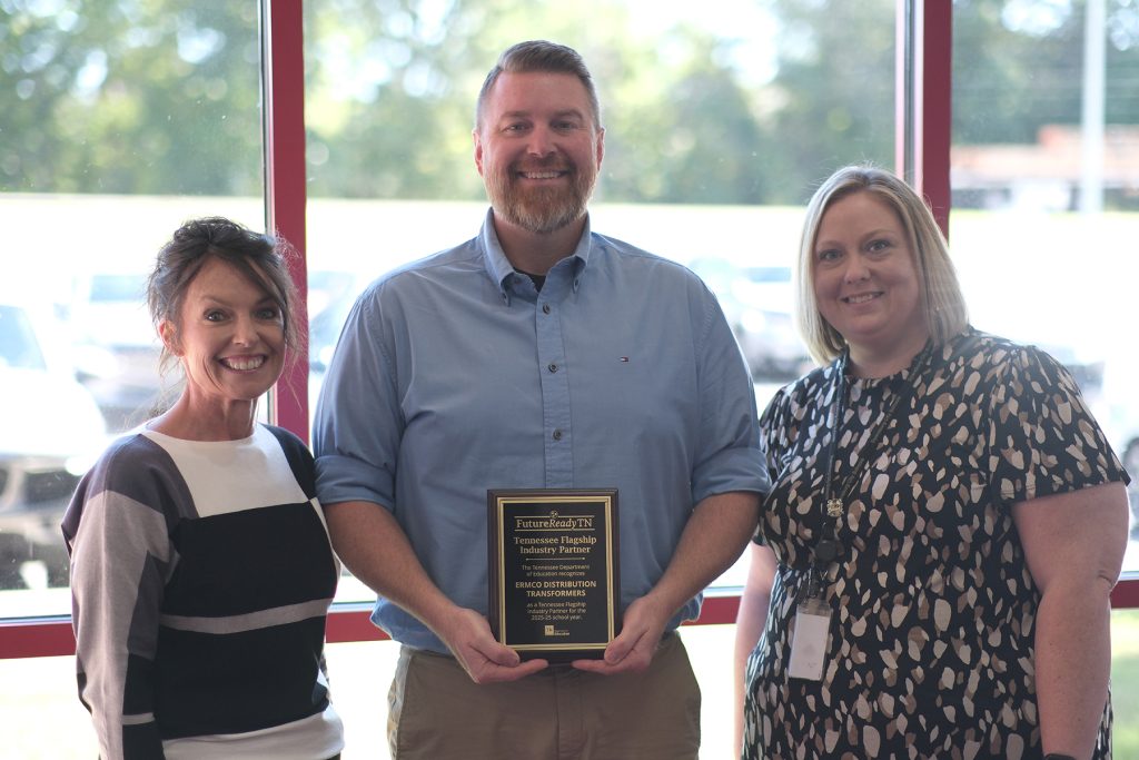 Debbie Hurt, ERMCO Chief of Staff; Brad Whittle, ERMCO Talent Acquisition Manager; and Kim Yeiter, Dyersburg City Schools CTE Director, stand together after ERMCO is honored for its contributions to STEM and Career Technical Education programs in Northwest Tennessee. Since 2022, ERMCO has donated over $520,000 to support local school initiatives, including Dyersburg City Schools.